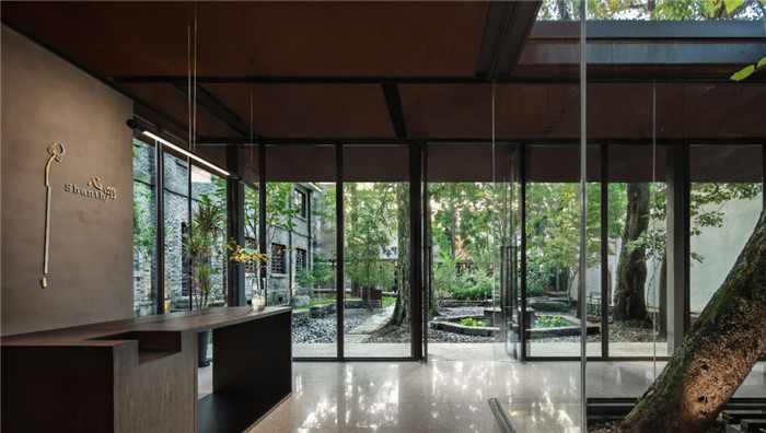 酒店大堂接待臺(tái)設(shè)計(jì)-集書店、咖啡、美術(shù)館于一體的精品酒店設(shè)計(jì)方案